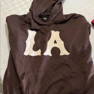 PacSun Chocolate Brown Hoodie with Cream 'LA' Design